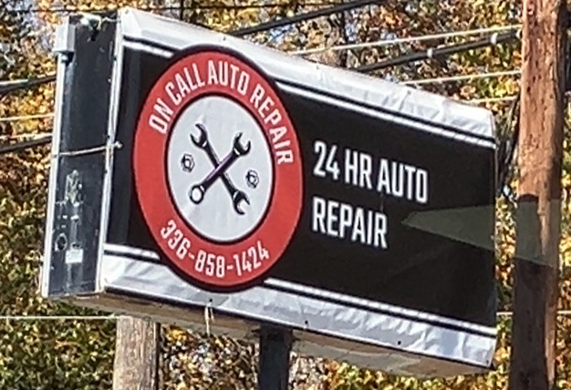 front sign of on call auto care in lexington north carolina they fix cars and trucks